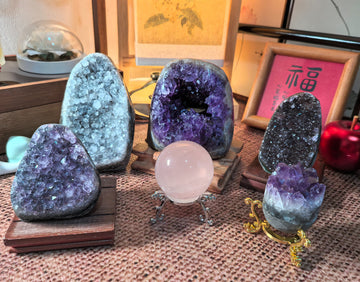Healing crystals in soft light with amethyst and citrine — ZenithMana online crystal shop showcasing stones for energy, balance, and abundance.
