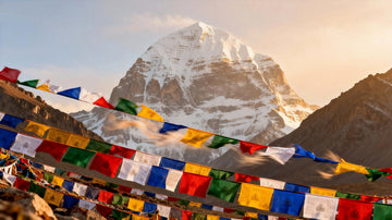 Mount Kailash under soft light with prayer flags and calm landscape, symbolizing healing, reflection, and spiritual intention.