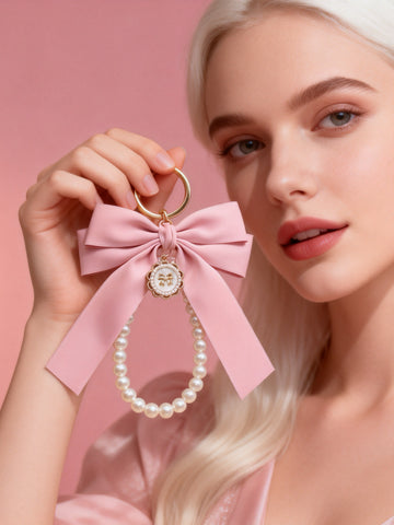 Matte Pink Bow Phone Charm - Pearl Wrist Lanyard, Stylish Gold-Tone Keychain & Aesthetic Handcrafted Accessory Gift for Women